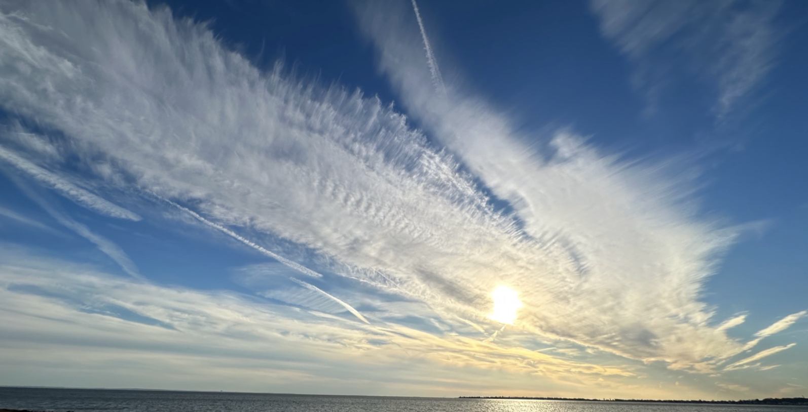 Above: persistent contrails forming in busy airspace over Long Island Sound. Credit: Dr Adam Durant. SATAVIA
